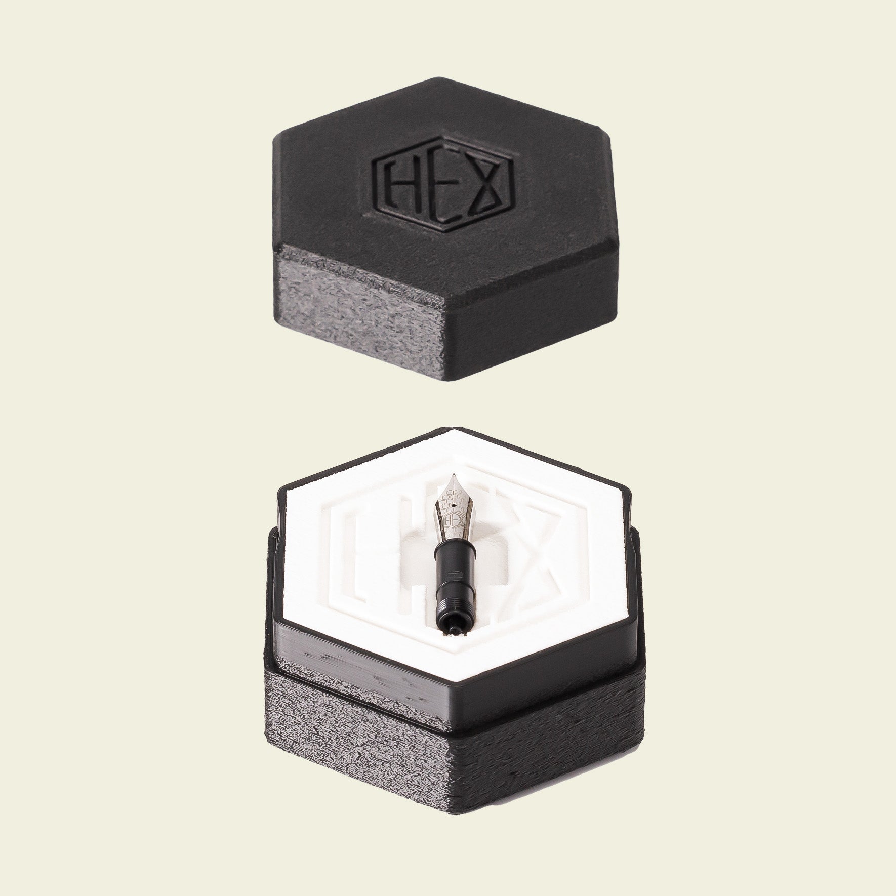 Fountain pen nib in a box with lid open, by Hex Pens