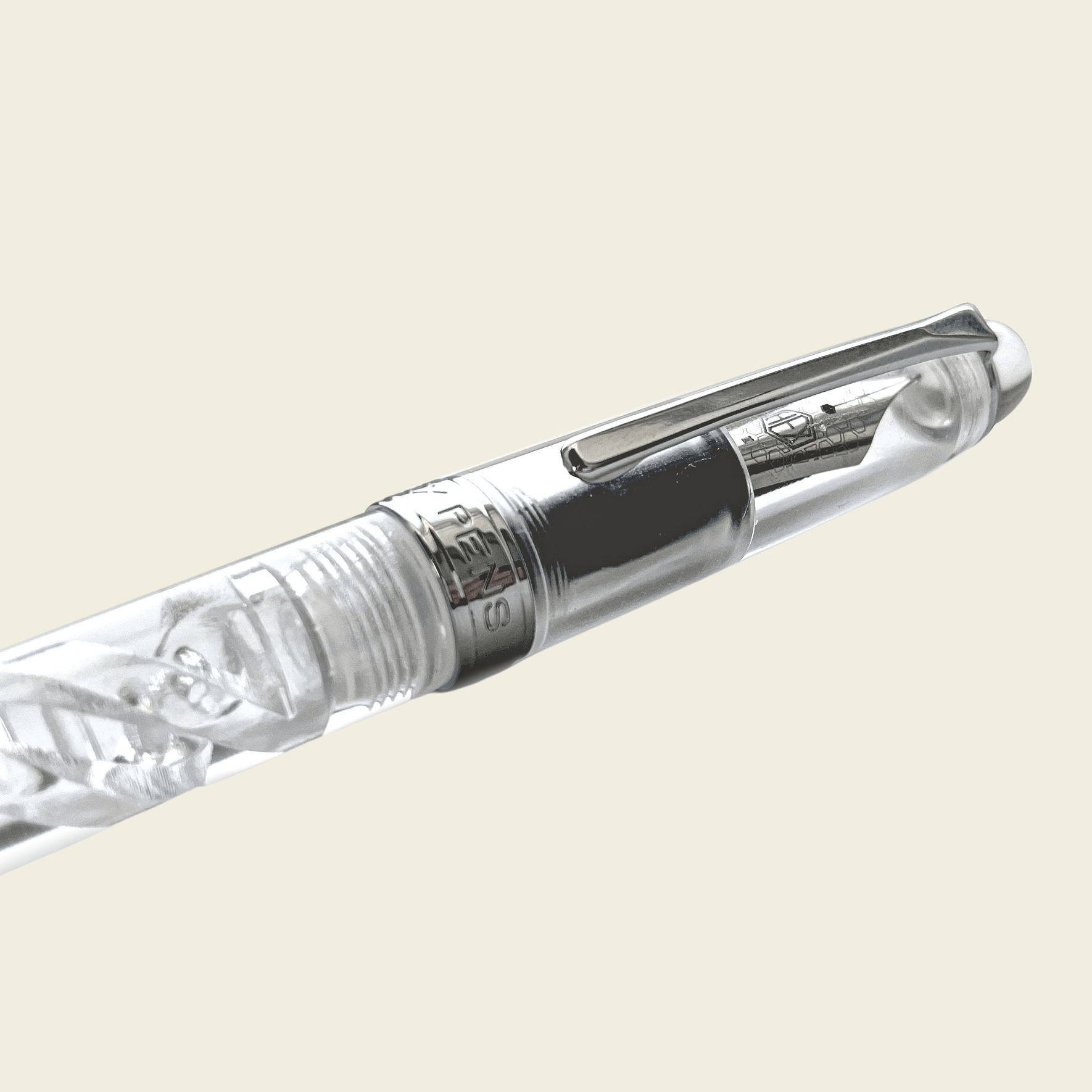 Half view of capped DNA Lucent fountain pen showing the cap side, by Hex Pens.