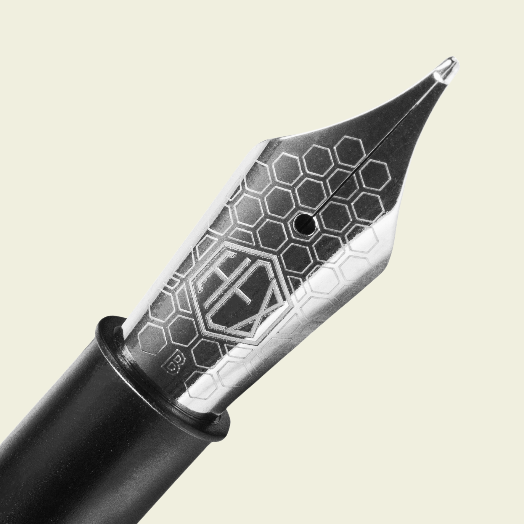 Close-up of fountain pen nib showing detailed engraving, by Hex Pens